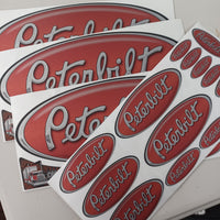 Red Metallic Peterbilt Emblem Skin Hood/Interior Kit